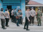 eksekusi2 Eksekusi Pengosongan sebidang tanah dan bangunan seluas 366 m² di Kelurahan Tavanjuka, Kecamatan Tatanga, Kota Palu, Propinsi Sulawesi Tengah, berjalan lancar. Foto : Polresta Palu