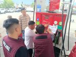 Polisi Segel Nosel Dispenser SPBU di Kota Palu Diduga Lakukan Kecurangan